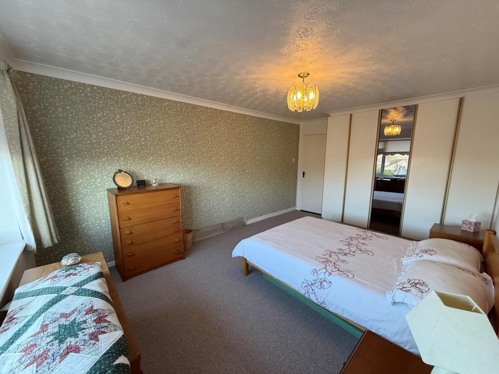 Lot: 1 - TWO-BEDROOM TOP FLOOR APARTMENT IN COASTAL LOCATION - Other view of main bedroom showing fitted wardrobe